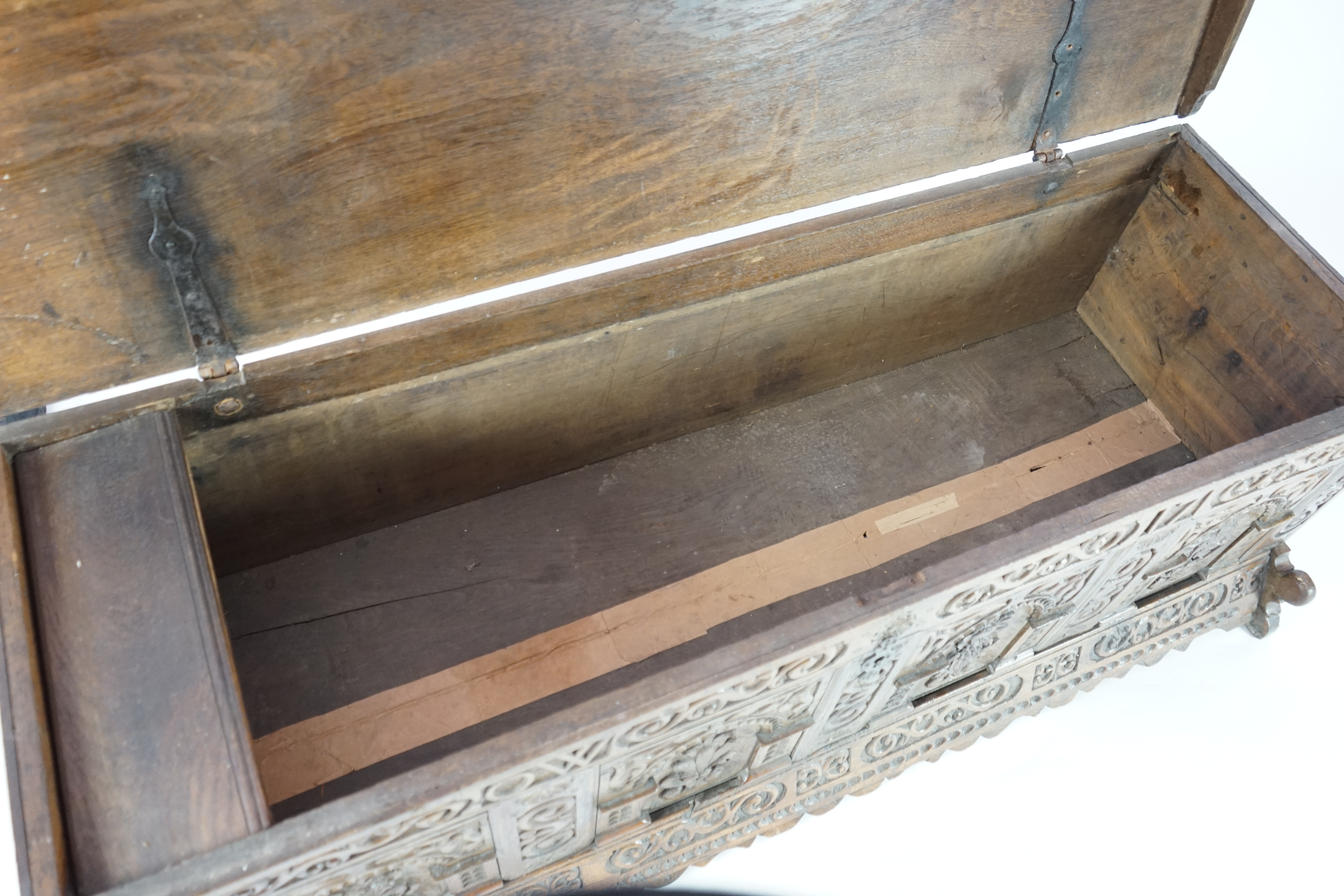 A mid 18th century German carved oak marriage chest